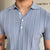 Gestreepte poloshirt - stijlvolle top voor mannen in zacht blauw